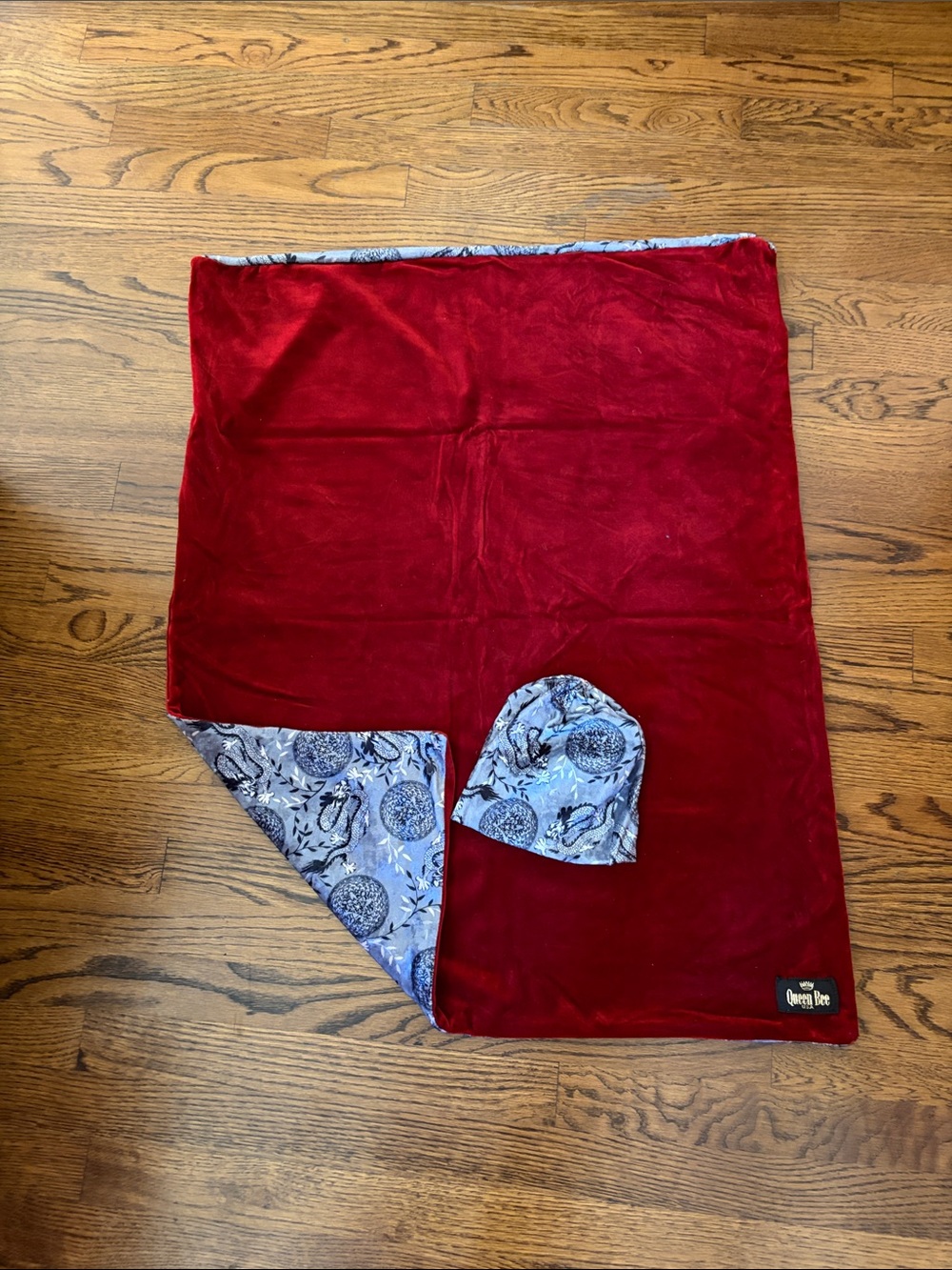 Red Velvet Reversible Blanket with dragon pattern matching beanie